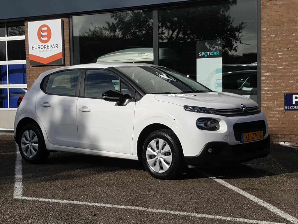 Citroen C3 1.2 puretech 82pk s&s feel navigatie | trekhaak | cruise & climate control | parkeersensoren achter | bluetooth | 4seasonsbanden | mistlampen