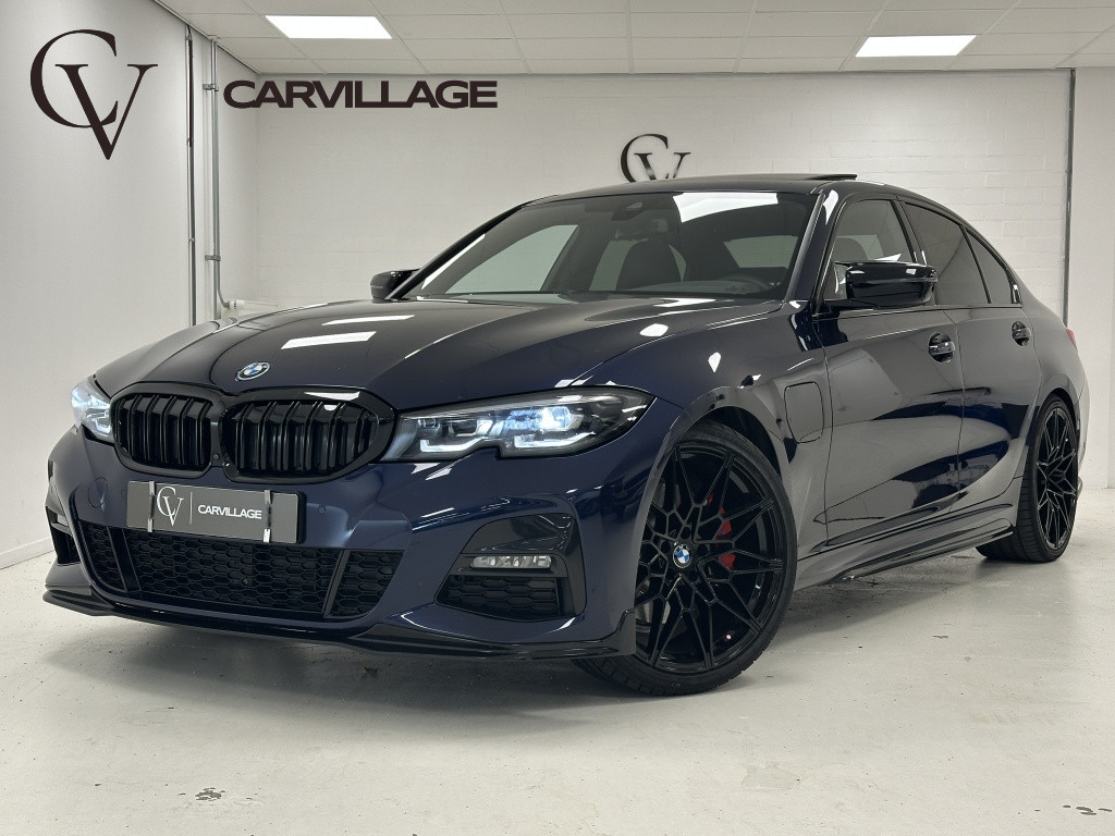 BMW 3-serie 330e m-sport | tansanitblau | schuif/kanteldak | memory |
