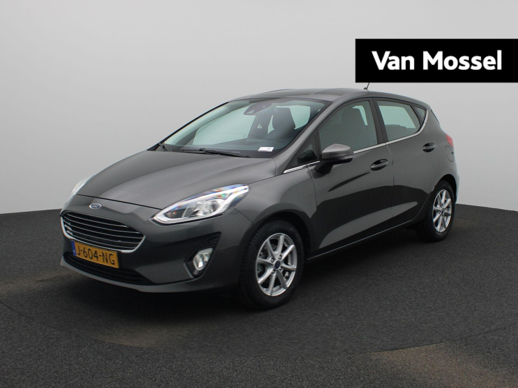 Ford Fiesta 1.0 ecoboost titanium | winterpack | stoel/stuur verwarming | lmv | parkeer sensoren | cruise control | bluetooth | navigatie | climate control |