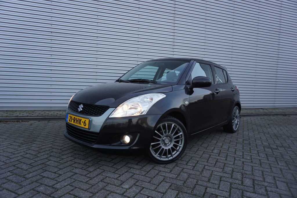 Suzuki Swift 1.2 comfort easss airco / elektr. ramen / parkeersens. / lm velgen / nap