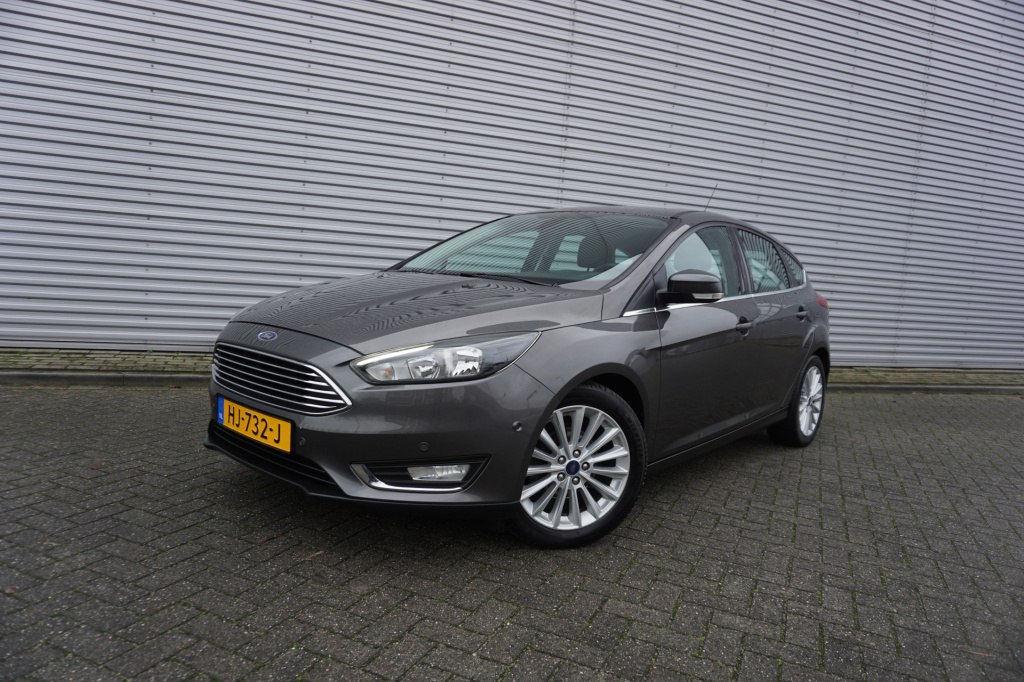 Ford Focus 1.0 titanium edition 1e eigenaar / navi / climate controle / cruise / lm velgen