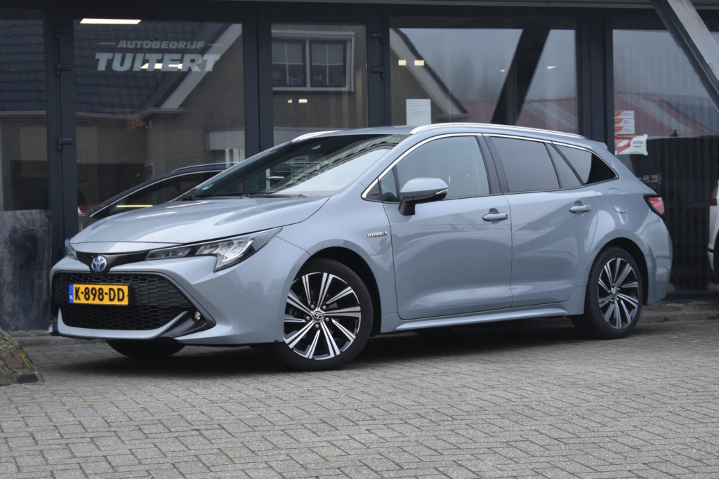 Toyota Corolla Touring Sports 1.8 hybrid dynamic | trekhaak | apple carplay | dealer onderhouden | android auto | nap