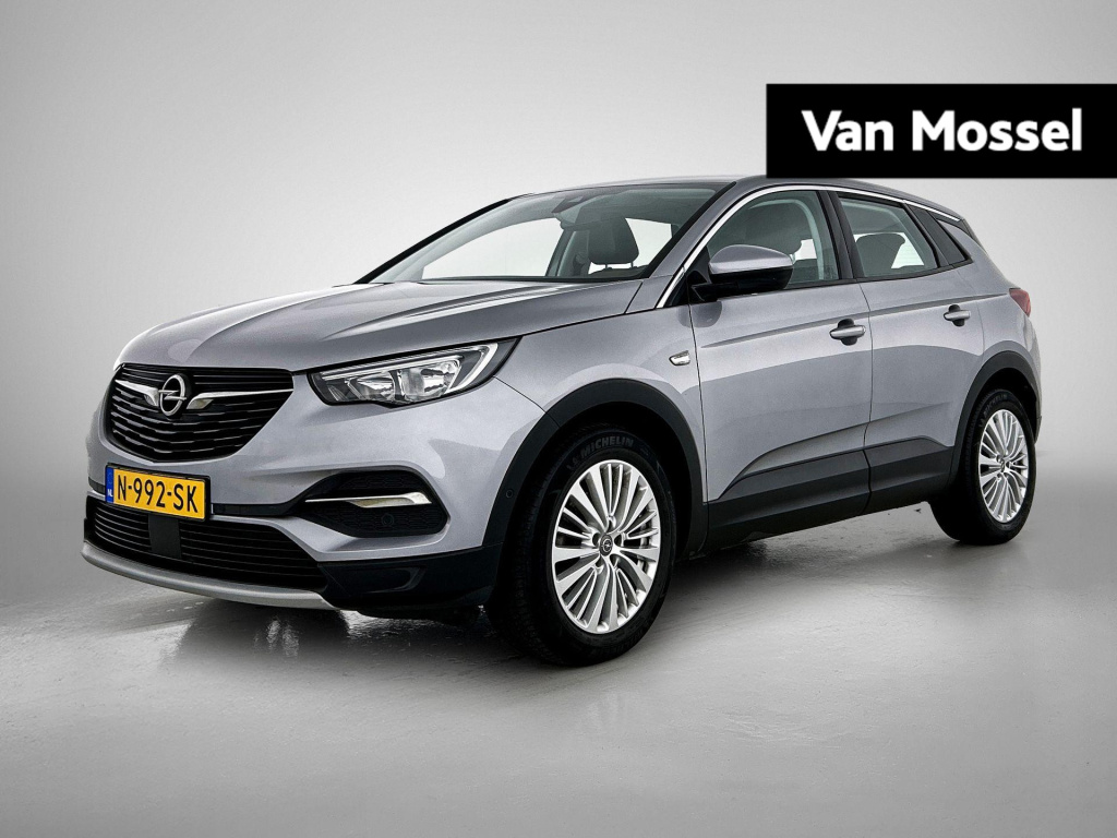 Opel Grandland X 1.6 turbo business executive | trekhaak | lmv | parkeer sensoren | navigatie | apple carplay | stoel/stuur verwarming | climate control | camera | half leder | apple carplay