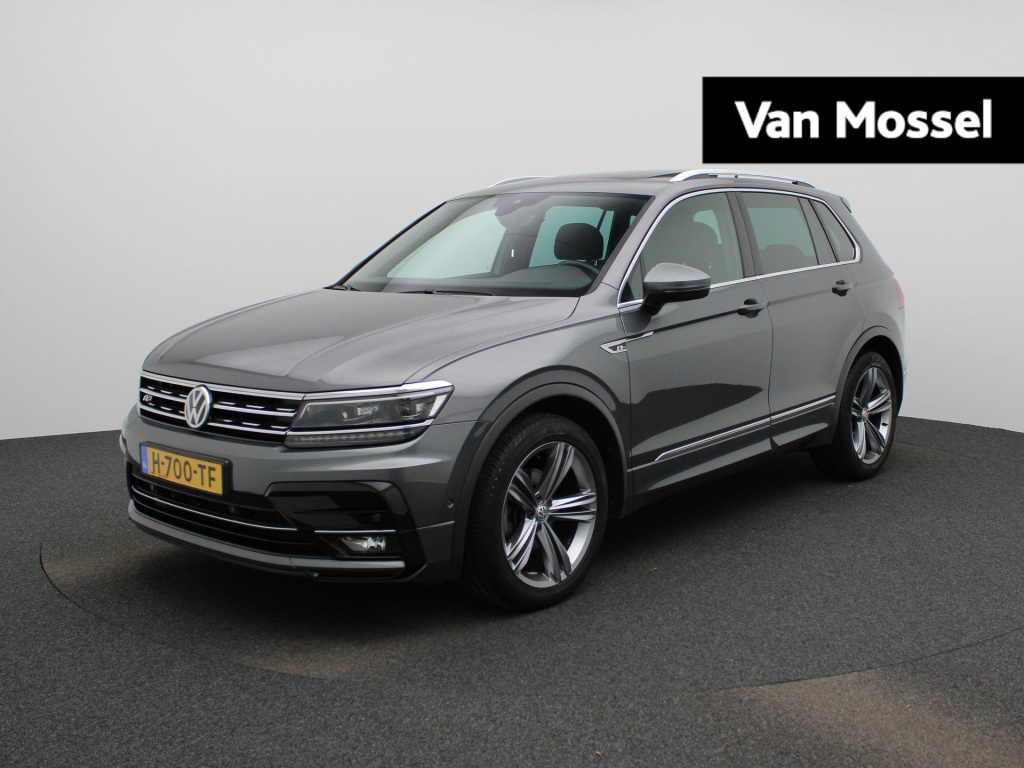 Volkswagen Tiguan 1.5 tsi act highline business r | automaat  | panoramadak | stoel verwarming | virtual cockpit | navigatie | camera | climate control | parkeer sensoren | schuifdak | lmv | led | trekhaak
