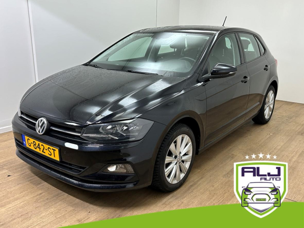 Volkswagen Polo occasion 1.0 tsi highline | zwart | tweedehands volkswagen polo | stoelverwarming | airco | cruisecontrol
