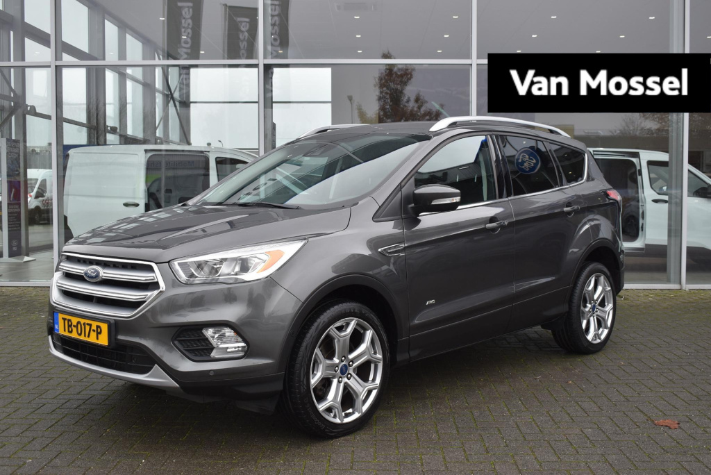 Ford Kuga 1.5 titanium 4wd | climate control | cruise control | achteruitrijcamera | elektrisch wegklapbare trekhaak | elektrisch bedienbare achterklep | voorruit verwarming | 19 inch lichtmetalevelgen |