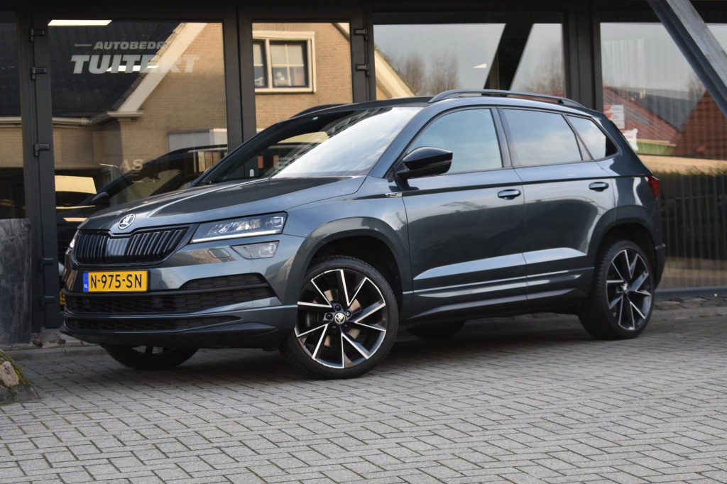 Skoda Karoq 1.5 tsi act sportline | trekhaak | virtual | camera | nap | apple carplay | android auto