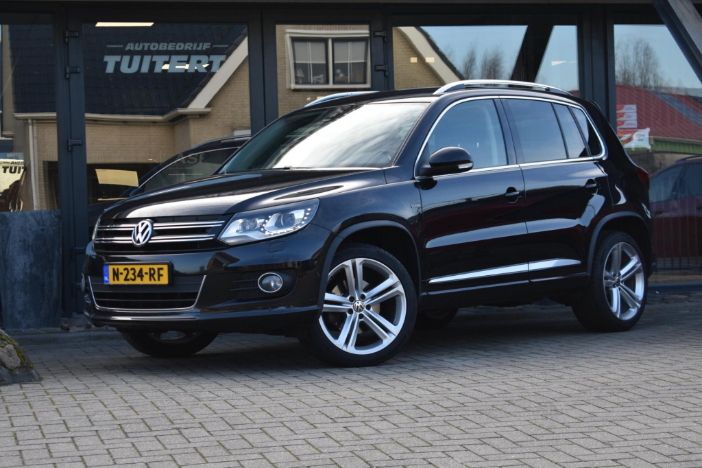 Volkswagen Tiguan 1.4 tsi r-line lm | trekhaak | xenon | led | stoelverwarming | navi | cruise controle