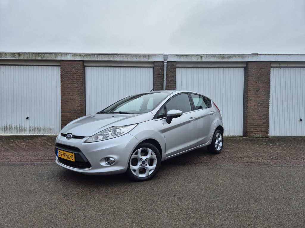 Ford Fiesta 1.25 titanium / origineel nl / airco / verwarmde voorruit