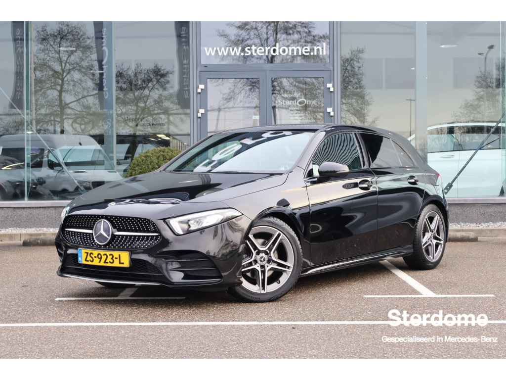 Mercedes-Benz A-Klasse 180 business solution amg i btw i automaat i camera i mbux i widescreen i led i stoelverwarming i nederlandse auto i i night pakket i parkeersensoren i