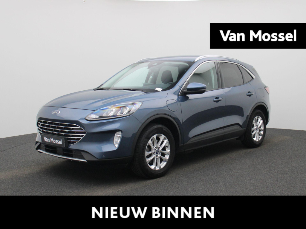 Ford Kuga 2.5i phev aut. 165kw titanium | automaat | lmv | virtual cockpit | cruise control | camera | bluetooth | apple carplay | navigatie | climate control | winterpack | stoel/ stuur verwarming | dab | parkeer sensoren
