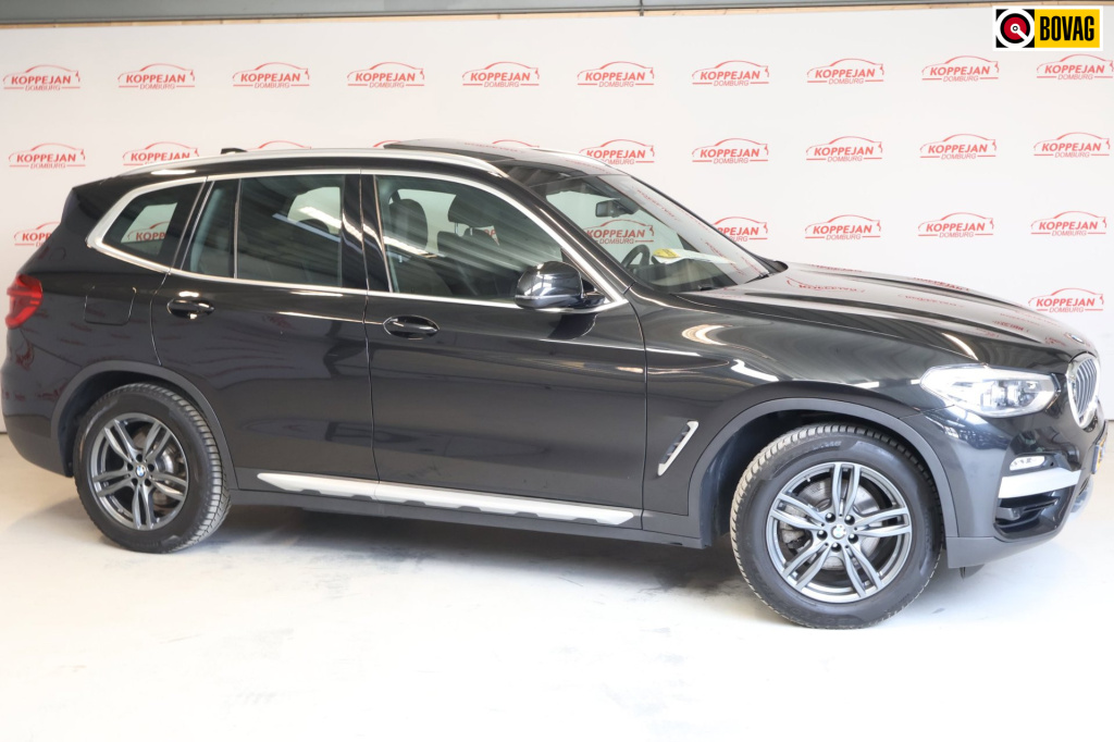 BMW X3 xdrive20i high executive nl auto, pano, trekhaak, stoelverw, led, el koffer