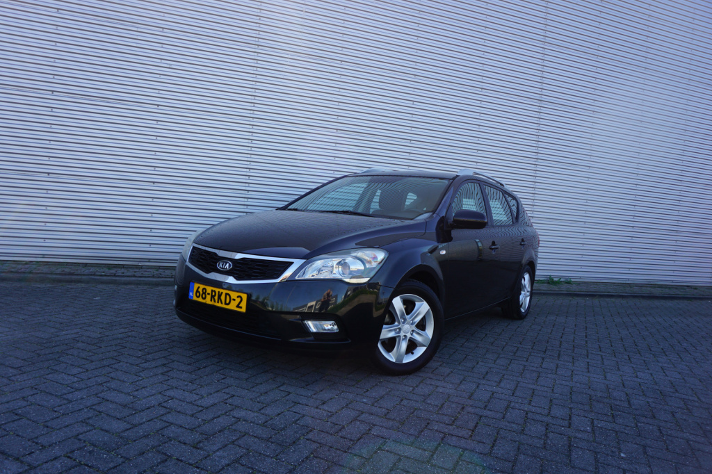 Kia Cee'd sporty wagon 1.4 cvvt x-ecutive airco / navi / cruise / elektr. ramen / trekhaak / lm velgen / nap