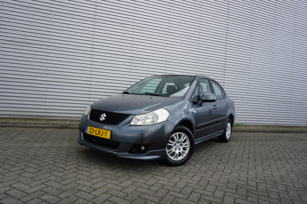 Suzuki Sx4 1.6 exclusive airco / elektr. ramen / parkeersens. / trekhaak / lm velgen / nap