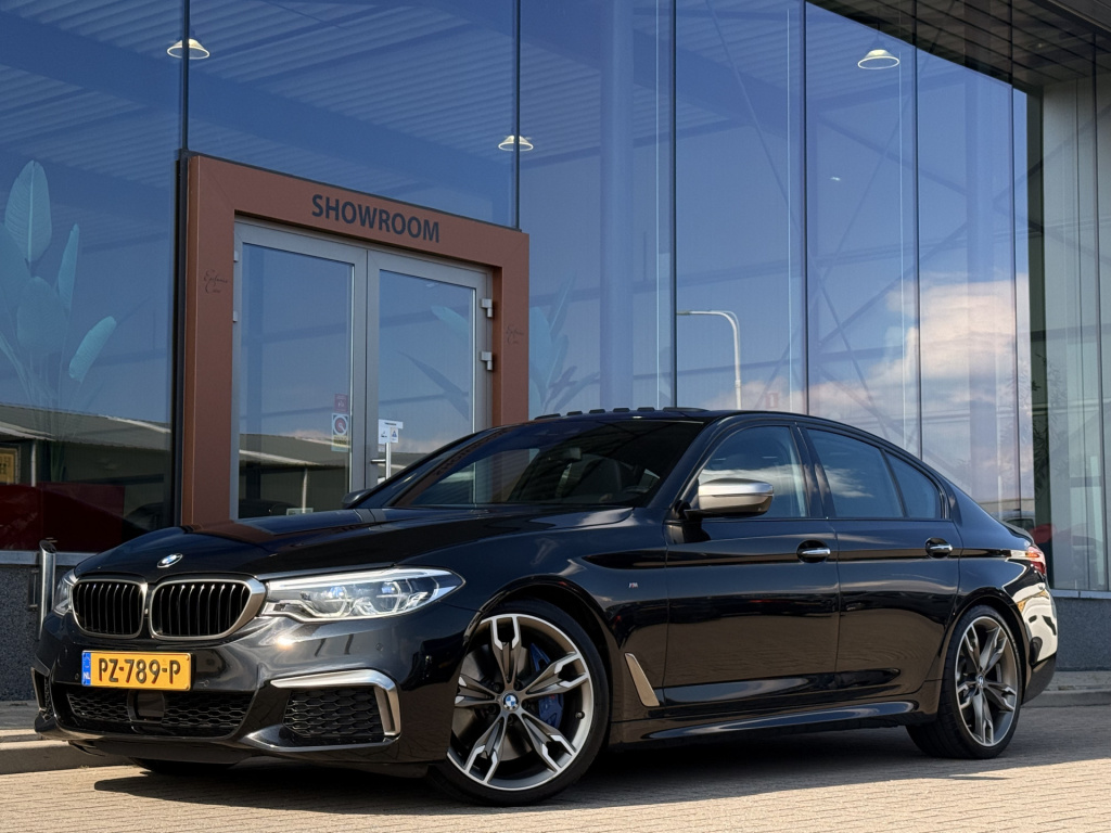BMW 5 Serie m550i xdrive high executive | 4ws | soft-close | pano | b&w | massage | memory | rear entertainment screens |