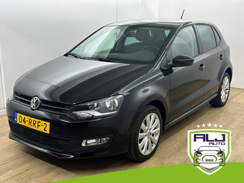 Volkswagen Polo occasion 1.2 tsi highline | zwart | tweedehands volkswagen polo | airco | bluetooth audio | cruise | trekhaak