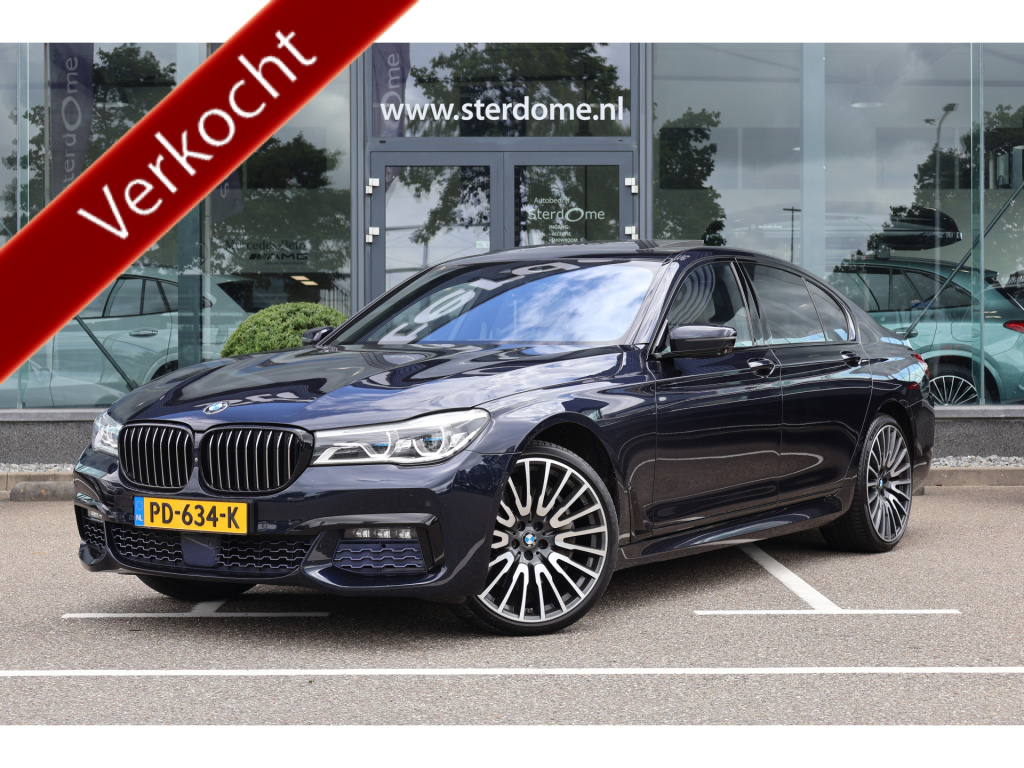 BMW 7 Serie 750i xdrive high executive 449 pk i schuif- kanteldak i luchtvering i 360 camera i softclose i b & w i stoelverwarming/ventilatie i beige leder i