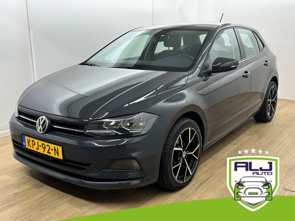 Volkswagen Polo occasion 1.0 mpi trendline | grijs | tweedehands volkswagen polo | airco | cruise | carplay audio | sensoren | nav