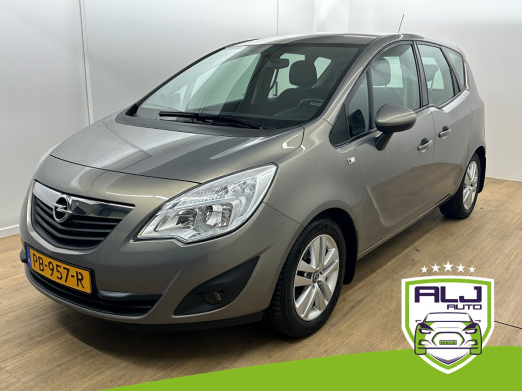 Opel Meriva occasion 1.4 cosmo | bruin | tweedehands opel meriva | airco | trekhaak | aux audio | cruisecontrol