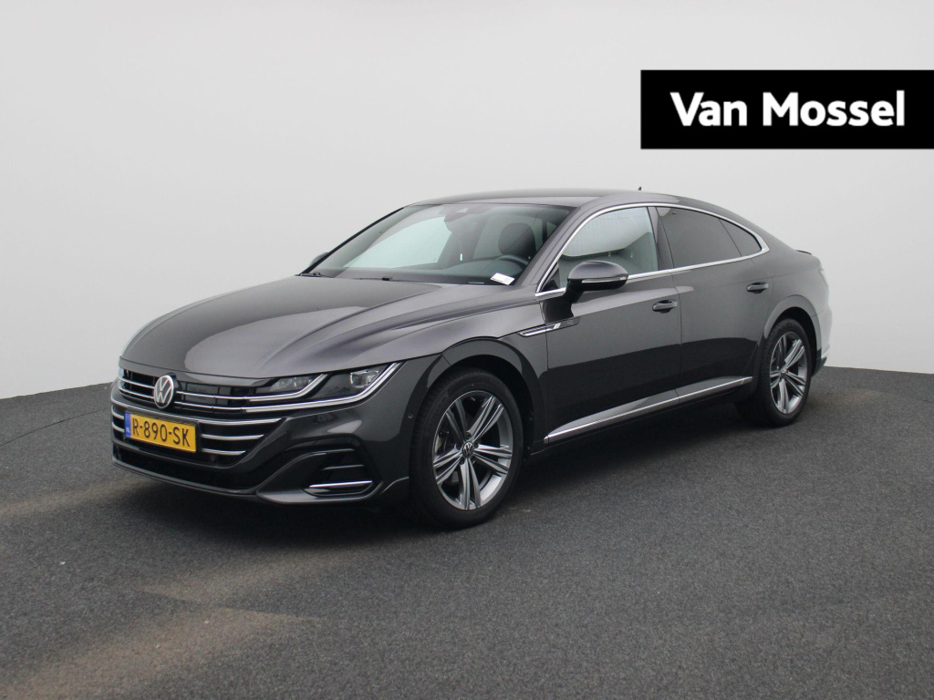 Volkswagen Arteon 1.4 tsi ehybrid r-line business+ | automaat | virtual cockpit | half-leder | trekhaak | navigatie | adap. cruise control | stoel/stuur verwarming | apple carplay | climate control | parkeer sensoren | lmv | led | camera | dab
