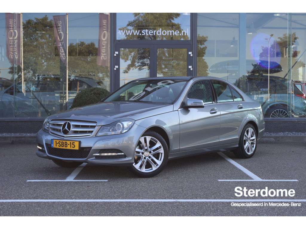 Mercedes-Benz C-Klasse 180 prestige avantgarde i trekhaak i lederen bekleding i tempomaat i stoelverwarming i i navigatie i airco i goed onderhouden i