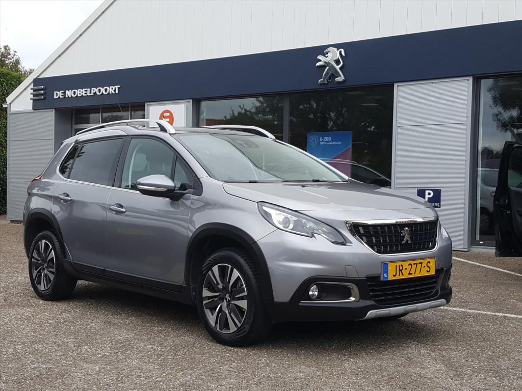 Peugeot 2008 allure1.2 puretech 110pk navigatie | cruise & climate control | parkeersensoren achter | panoramadak | bluetooth | lm-velgen | iso-fix |