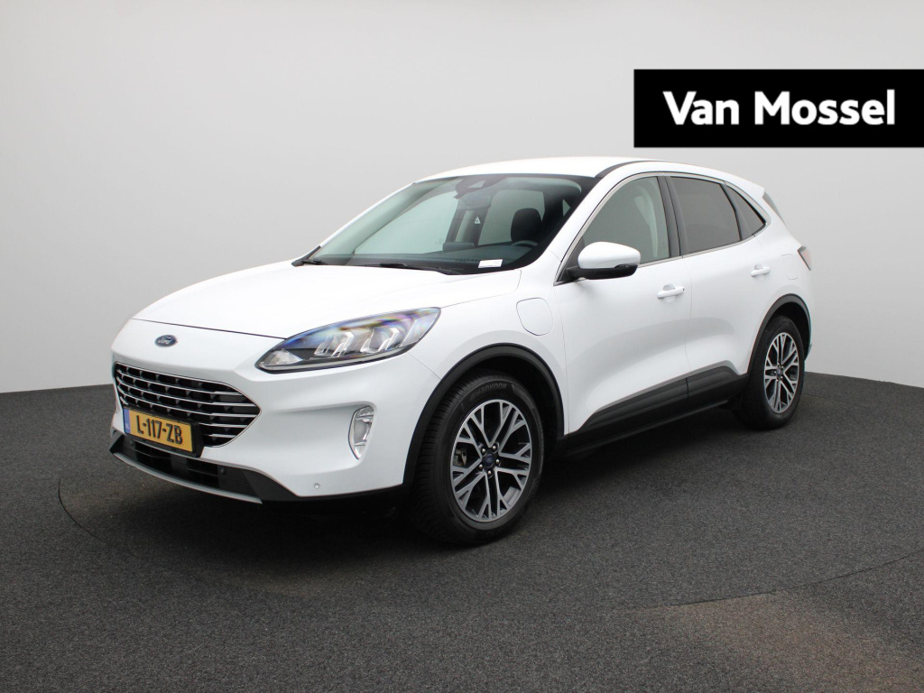 Ford Kuga 2.5 phev titanium | automaat | navigatie | trekhaak | navigatie | stoel/stuur verwarming | climate control | bluetooth | dab | cruise control | airco | parkeersensoren | lichtmetalen velgen |