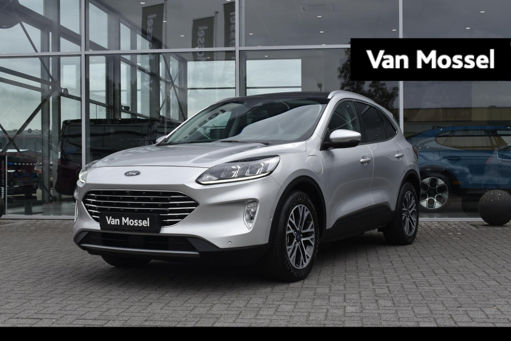 Ford Kuga 2.5 phev titanium x | climate control | adaptive cruise control | winterpack | panoramadak | elektrische achterklep | achteruitrijcamera | dodehoekdetectie | apple carplay/android auto |