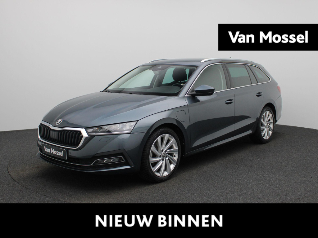 Skoda Octavia combi 1.4 tsi iv phev business edition | automaat | virtual cockpit | stoel verwarming | navigatie | apple carplay / android auto | lichtmetalen velgen | parkeersensoren | keyless start | cruise control
