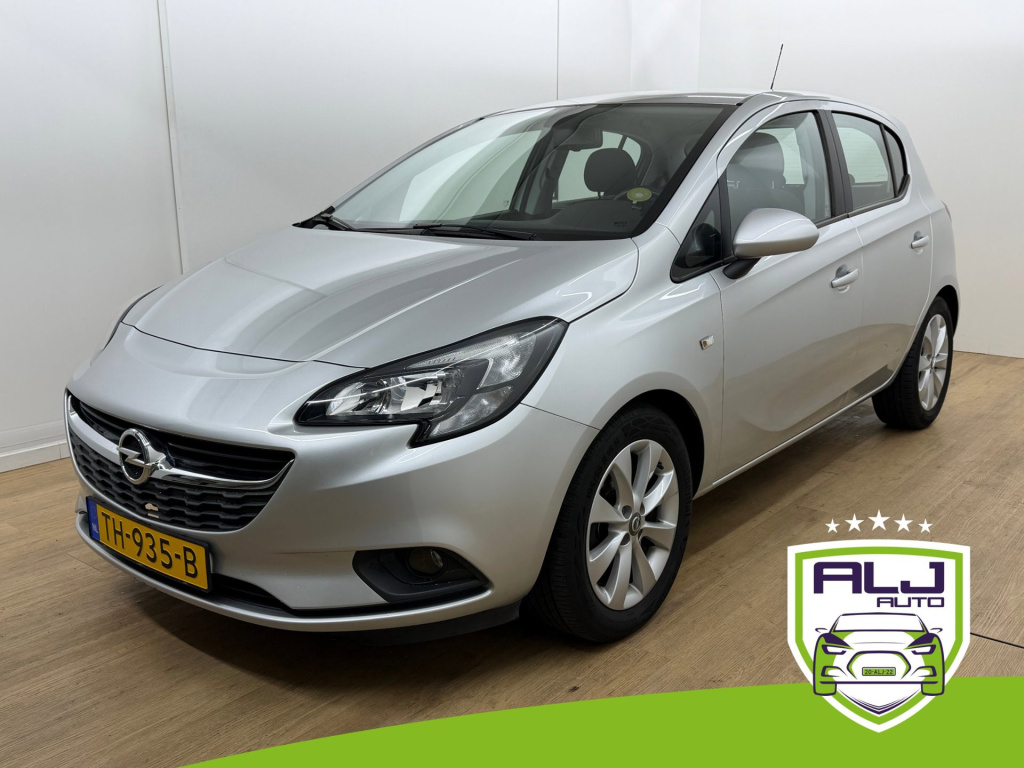 Opel Corsa occasion 1.4 favourite | grijs | tweedehands opel corsa | airco | bluetooth | trekhaak | cruisecontrol