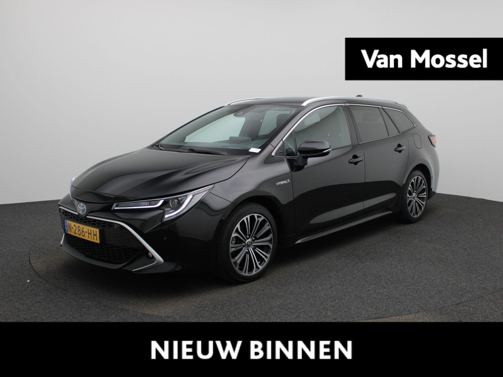 Toyota Corolla Touring Sports 1.8 hybrid executive | automaat | stoel verwarming | parkeer sensoren | dab  | camera | climate control | cruise control | bluetooth | half leder