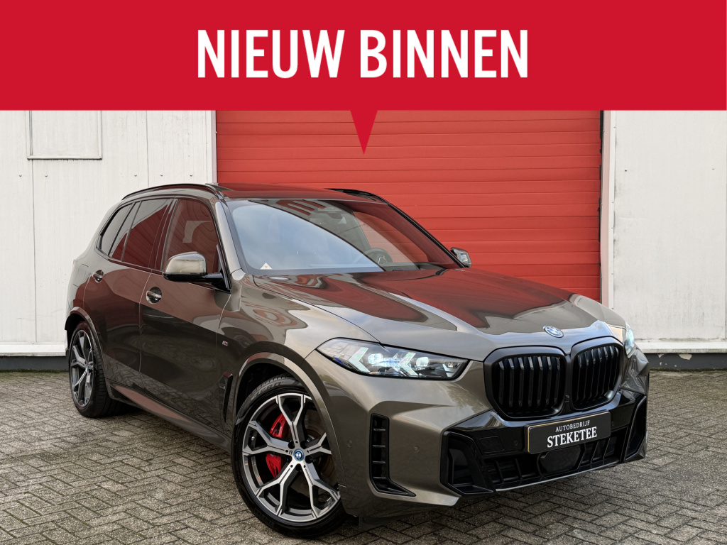BMW X5 xdrive50e m-sport | pano | luchtvering | elek. trekhaak | rijklaar inclusief 1 jaar bmw premium selection!
