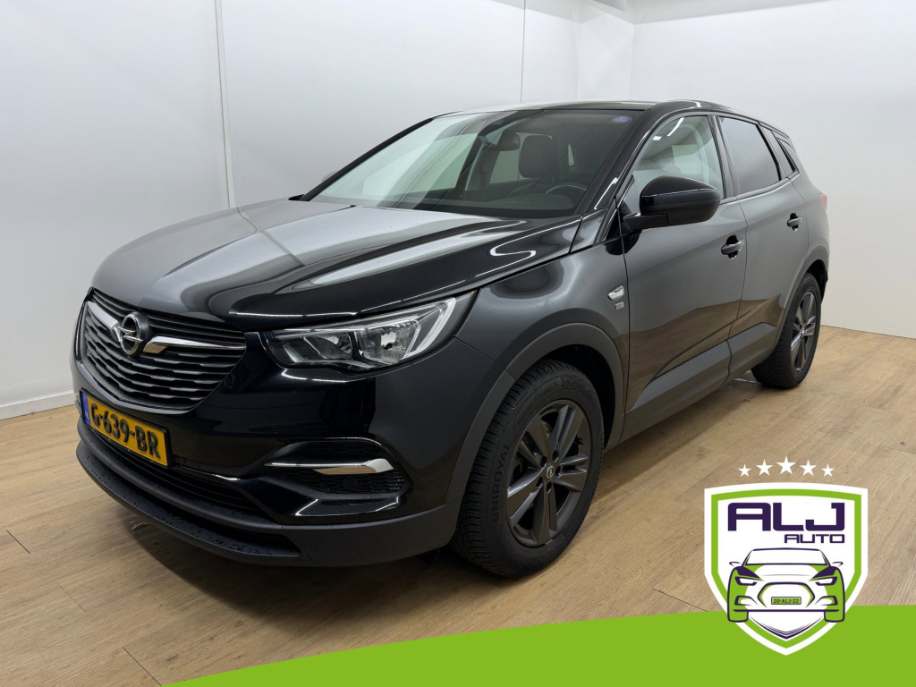 Opel Grandland X occasion 1.2 turbo 120 jaar edition | zwart | tweedehands opel grandland | airco | bluetooth | camera | cruise